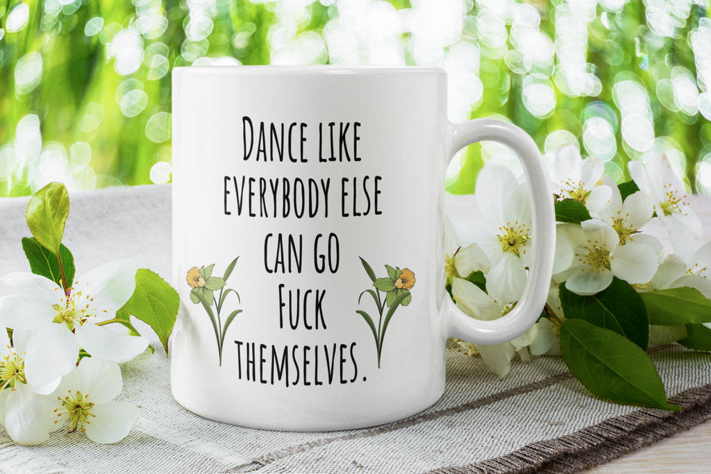 http://unlawfulthreads.com/cdn/shop/products/mockup-of-an-11-oz-coffee-mug-with-pretty-flowers-45398-r-el2_d0aa7232-3fa8-49a1-ba8a-70daa666bfc7_1024x1024.png?v=1617972761