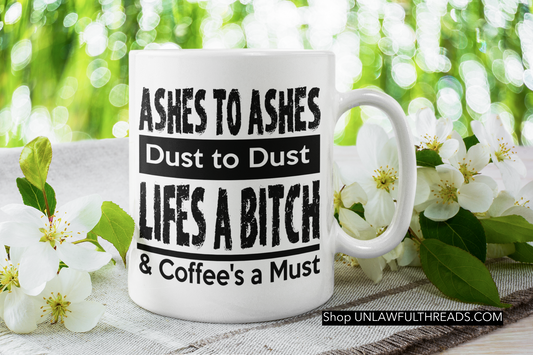Ashes to Ashes dust to dust Lifes a Bitch & Coffee's a Must coffee mug 15 ounces.