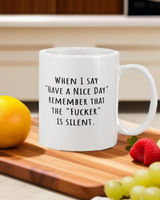 When I say "Have a Nice Day" remember that the "Fucker" is silent coffee mug 15 ounces