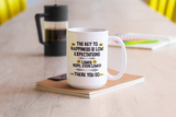 The key to happiness is low expectations coffee mug 15 ounce